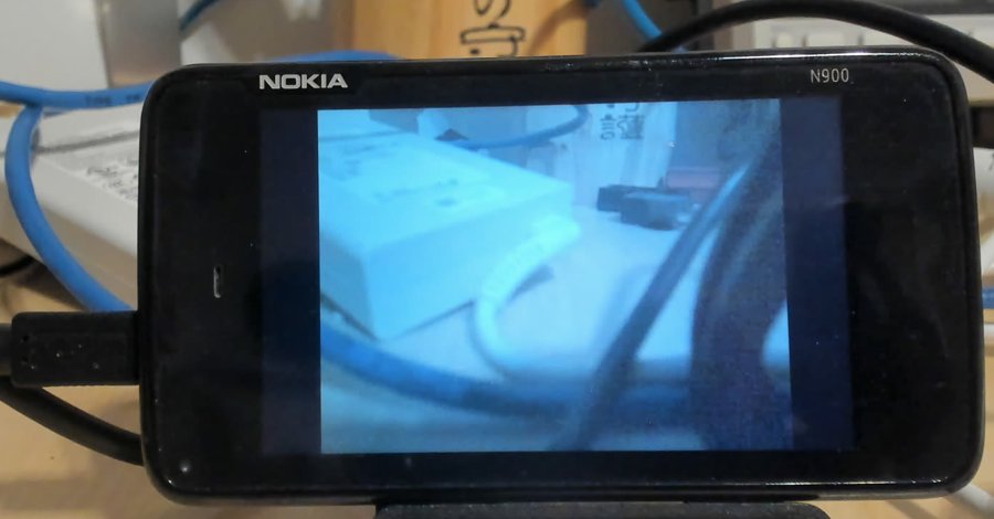 The N900 showing a live camera preview of the bench behind it