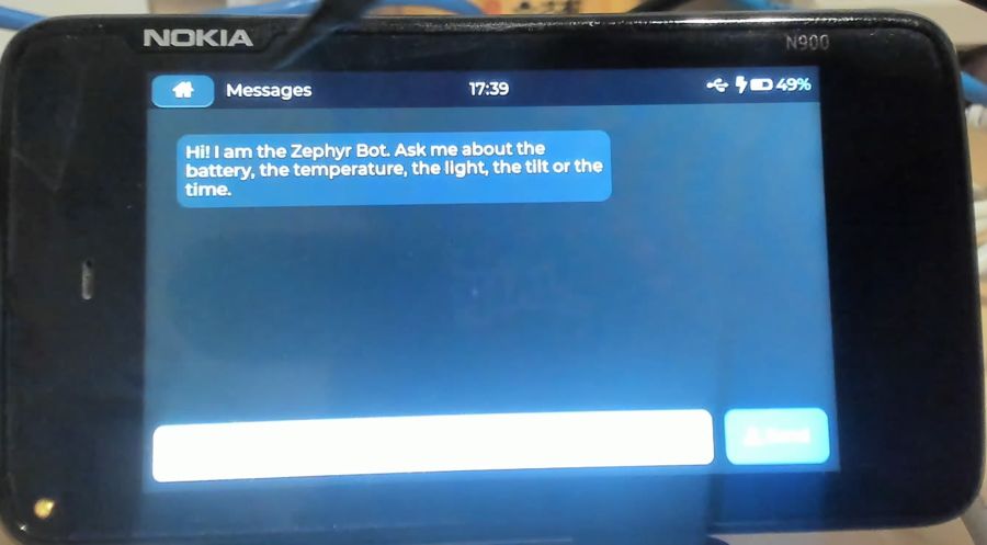 Messages app with the Zephyr Bot greeting, status bar showing USB, charging and 49 percent